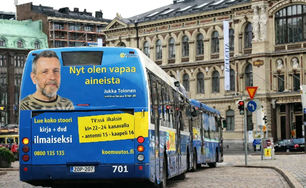 A Helsinki-area bus showing a Mega City Media Campaign advertisement.