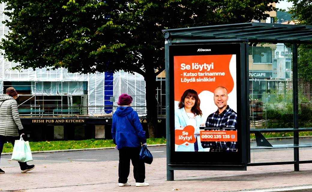 image showing a city bus stop advertisement