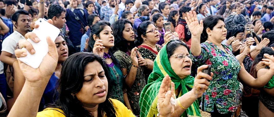 Large audience seated at a gathering in Sri Lanka.